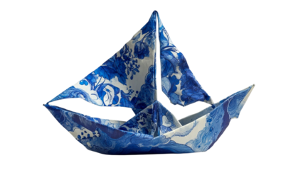 PNG of An elegant blue and white paper sailboat crafted with artistic floral patterns, symbolizing creativity and imagination.