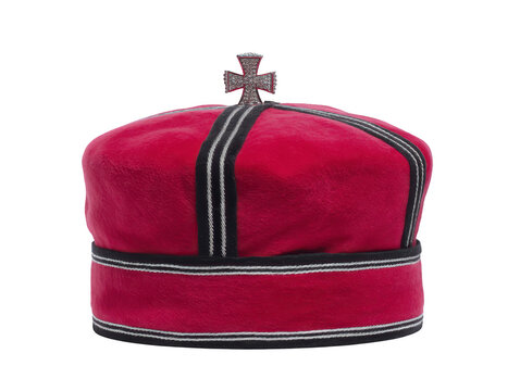 Red velvet bishop hat with black and white trim, silver cross on top, religious ceremonial headwear, traditional Christian clergy accessory, isolated on transparency background