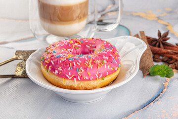 Sweet donut with strawberry icing