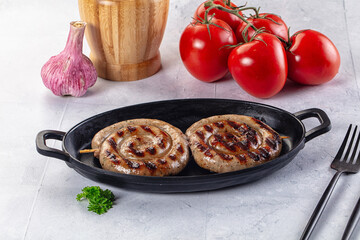 Grilled beef round circle sausages
