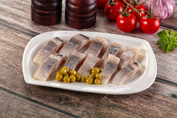 Slided marinated salted herring fillet