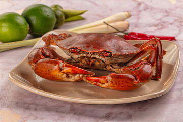 Gourmet steamed crab served lime