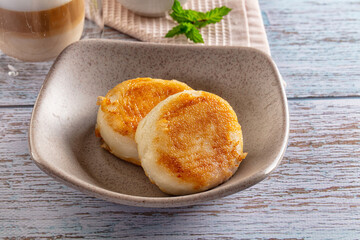 Fried homemade cottage cheese syrniki