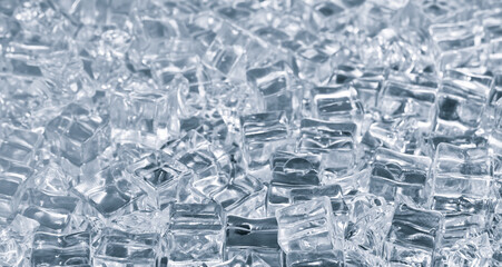 Drinking ice cubes as a cool textured background for a blue wallpaper banner page design