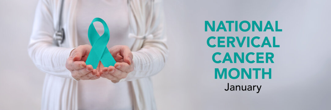 Doctors Hands Presenting Teal Awareness Ribbon - Cervical Cancer Awareness Concept