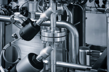 Food production machine with stainless steel pipes, cooling radiator as separator and tanks, valves...