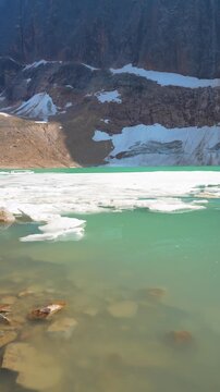 Edith Cavell Lake in Jasper National Park, surrounded by majestic mountains and glaciers