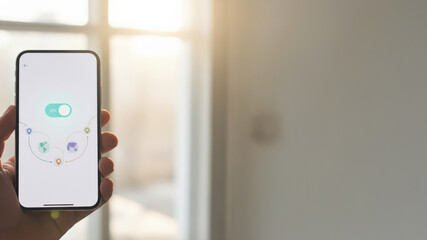 smartphone with app showing global connectivity concept against window background. bright sunlight creates a modern, tech-savvy ambiance ideal for illustrating connectivity and network themes