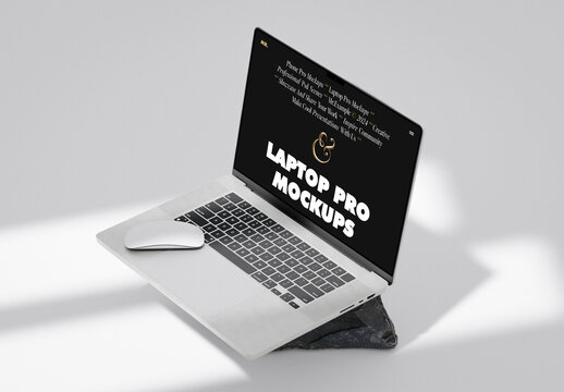 Laptop With The Mouse On Stone Mockup