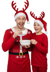 A cheerful father with his son is celebrating Christmas