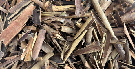Broken Ceylon Cinnamon Textured Background, Cinnamomum Verum Bark Pieces Pattern