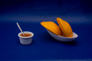 Tasty Colombian Fried Pastries Stuffed with Chicken