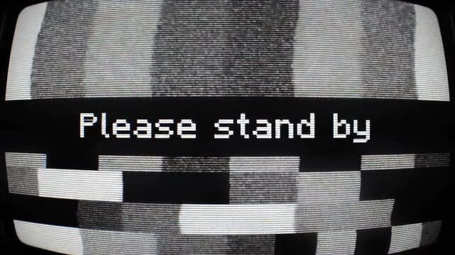 An old television displaying a please stand by message on a static screen, creating a sense of technological malfunction and anticipation please stand by