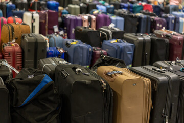 Suitcases waiting, luggage on floor, travel bags, travel preparation