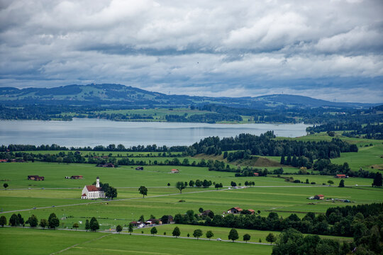 A cloudy autumn day near a castle at the foot of the Alps. - Powered by Adobe