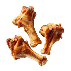 Three cooked chicken bones with a glossy golden brown appearance isolated on a clean white background