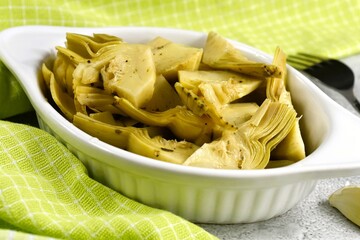 Artichokes in sunflower oil vinegar with garlic. Cynara cardunculus.