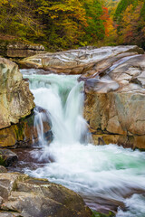 waterfall in autumn forest