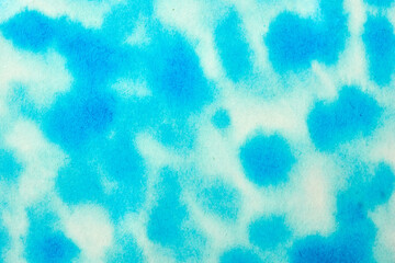Bright blue abstract pattern with a soft watercolor effect in the background