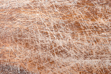 Surface texture shows scratches and patterns from wear and use