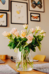 Beautiful bouquet of fresh roses with soft petals and natural leaves, elegant floral arrangement symbolizing love and romance on bright background