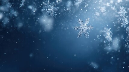 Beautiful Close-up of Snowflakes Falling with a Soft Blue Background, Perfect for Holiday or Winter Projects