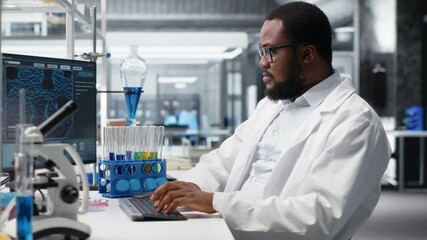 Scientist typing on keyboard, using computer program for DNA data analysis in laboratory driving treatment discovery. Expert using bioinformatics software on PC in sterile lab, camera B - Powered by Adobe