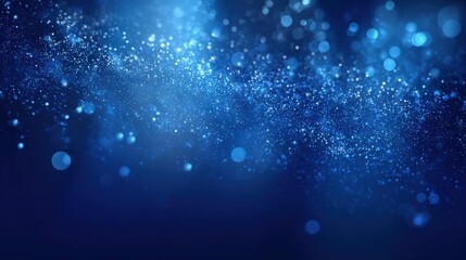 Obraz premium Abstract Blue Glittering Particle Background with Bokeh Effect for Festive Celebrations and Modern Technology