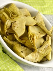 Artichokes in sunflower oil vinegar with garlic. Cynara cardunculus.