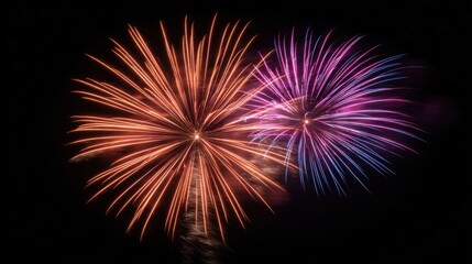 Fototapeta premium Vibrant Fireworks Display Illuminating Night Sky, Celebratory Explosions of Color, Festive Occasion, Celebrations And Events