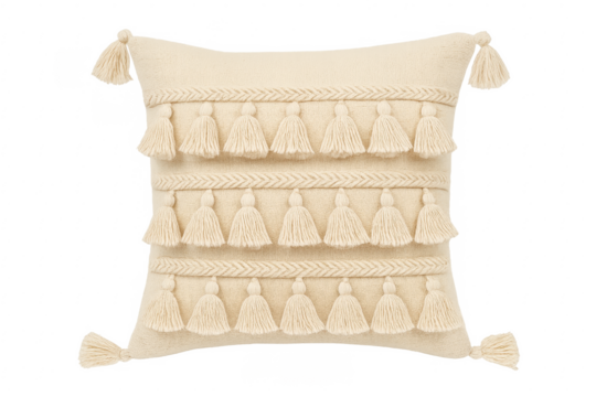 Beige bohemian pillow with decorative tassels and braids