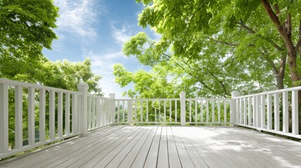 Obraz premium Sunlit Deck View: Tranquil Outdoor Space with Greenery and Blue Sky, Ideal for Relaxation and Nature