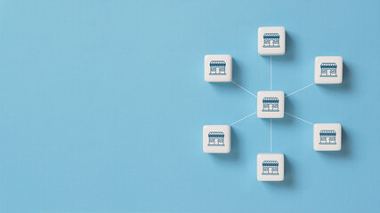 Dice with franchise icons, Franchise Business Marketing System concept