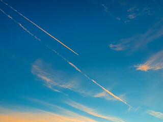 Aeroplane Trails Over a Blue Sky