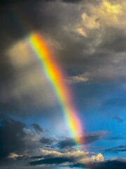A Rainbow Comes Out Of the Storm Clouds
