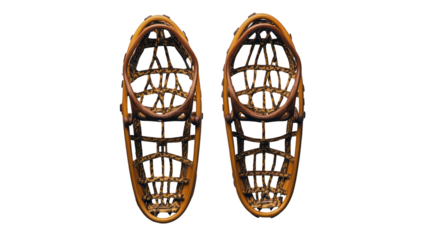Pair of vintage snowshoes isolated on transparent background