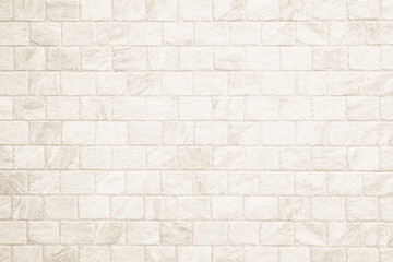 Detail of modern cream brick wall background photo. White light brick wall texture background for stone tile block painted in beige light color wallpaper modern interior and exterior backdrop design.