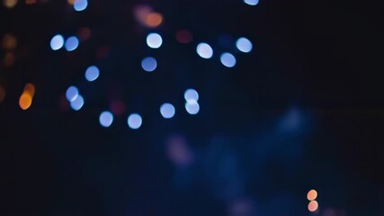Abstract Bokeh Lights Background with Festive Atmosphere and Warm Tones.