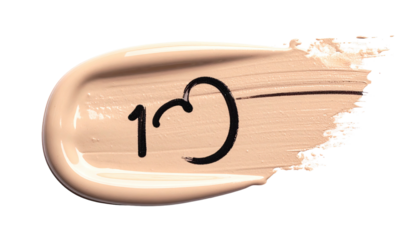 Creamy foundation swipe with dark number "10" on black background