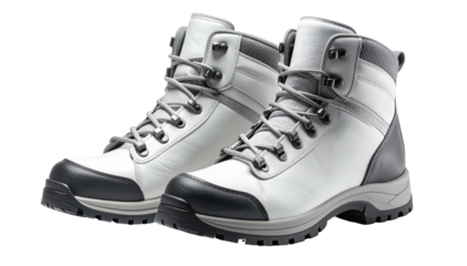 Pair of white/grey hiking boots with laces against black backdrop