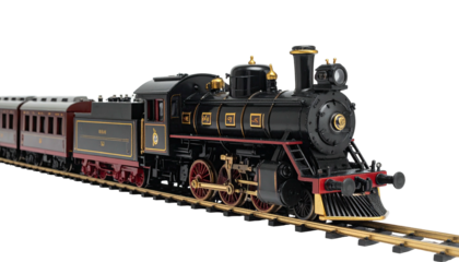 Sleek black locomotive pulls passenger cars along a railway