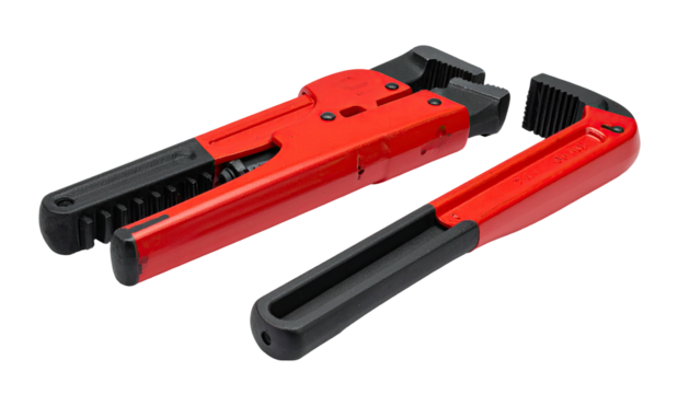 Two red/black wrenches displayed angularly against black background
