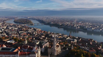 A breathtaking panorama of Budapest with the Danube River, Margaret Island, and the Parliament visible beyond Matthias Church.