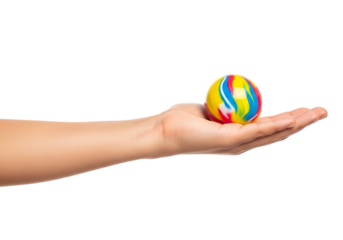 Human hand holding a vibrant colorful stress relief ball against a void . Isolated on transparent background, png