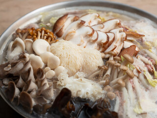 Hot Pot with various mushrooms and vegetables