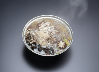 Hot Pot with various mushrooms and vegetables