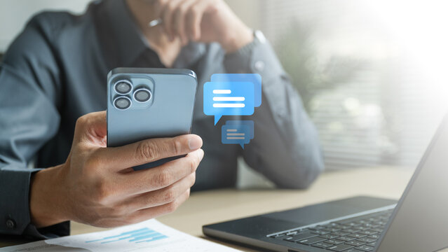 message, chat, messaging, texting, Close-up of a person using a smartphone for online chatting with message icons, representing digital communication, social connection, and modern technology.