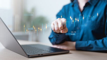 stock, investment, trading, A person analyzing a digital stock chart on a laptop, representing investment strategy, financial growth, and market trading concepts.