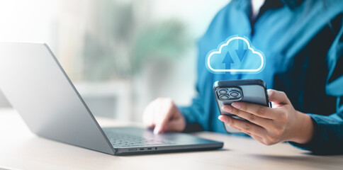 cloud, computing, storage, backup, A person using a smartphone and laptop with a cloud storage icon, representing data backup, online security, and digital computing technology.