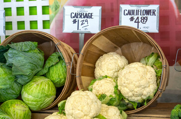 Cabbage and Cauliflower for sale t a fresh food market